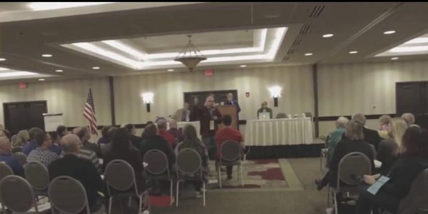 Gov. Tim Walz misspoke when he said he used weapons in war, the Harris campaign said